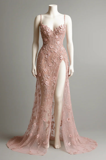 Pink evening gown with floral embroidery on a mannequin against a gray background